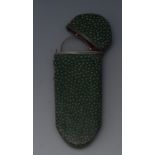A George III silver coloured metal mounted shagreen rounded rectangular spectacle case,