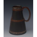 A Doulton Silicon silver mounted stoneware jug, as a leather jack, with copper effect banding,