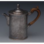 A George III silver coffee pot, gadrooned border, domed cover, ball finial, fruitwood handle,
