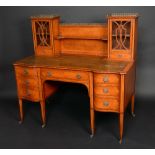 A Victorian satinwood lady's writing desk, probably by Maple and Co,