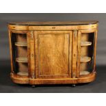 A Victorian gilt metal mounted walnut marquetry and ebonised shaped serpentine side cabinet,