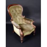 A Victorian mahogany armchair, deep-buttoned stuffed-over upholstery,