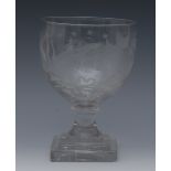 A George III clear glass pedestal bowl, rounded bucket shaped bowl, engraved with stylised bird,