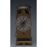 A small 19th century brass alarm timepiece, 6cm silvered dial inscribed with Roman numerals,