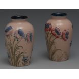 A pair of Moorcroft Macintyre miniature ovoid vases, tube lined with poppies and foliage,