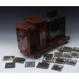 A 19th century table top mahogany and black painted tin Magic lantern,