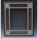 A Moorish hardwood, ebony, bone, and abalone marquetry rectangular mirror,
