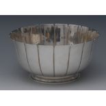 A George III style silver petal shaped bowl, moulded foot, 16cm diam, Cooper Brothers & Sons,