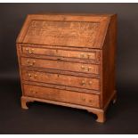 A George III mahogany crossbanded oak bureau,