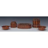 A 19th century Benham and Froud copper jelly mould, with six domed turrets, 14cm high,