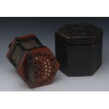A concertina, by Lachenal & Co, London, hexagonal mahogany fretwork ends, twenty one keys,