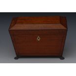 A George III satinwood sarcophagus tea caddy, hinged cover enclosing a pair of lidded compartments,