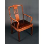 A Chinese hardwood elbow chair, of Ming design,