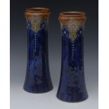 A pair of Royal Doulton spreading cylindrical vases,