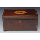 A large George III mahogany rectangular tea caddy,