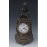 A French Second Empire bronze mantel clock, the enamel dial with blue painted Roman chapter, pierced