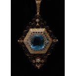 An aquamarine and diamond pendant, central cushion cut aquamarine, measuring 17mm x 15mm x 9mm,
