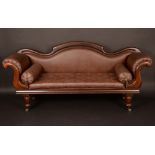 A Victorian mahogany scroll end sofa, shaped serpentine cresting rail,