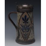 A Doulton Lambeth covered ale flagon, designed by Harry Barnard,