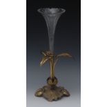 A 19th century bronze table centre epergne, clear glass trumpet shaped flute,