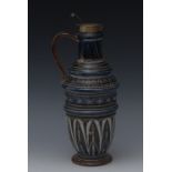 A Doulton Lambeth flagon, designed by Florence E.