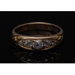 A Victorian style five stone diamond ring, central round brilliant cut diamond approx 0.