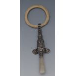 A George V silver baby's rattle, as a rabbit, teething ring, two bells, mother of pearl haft, 11.