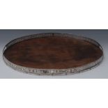 A large George III silver mounted oval gallery ray, pierced border, mahogany base, 53cm wide,