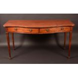 A George III mahogany serpentine serving table, two long cockbeaded drawer to frieze,