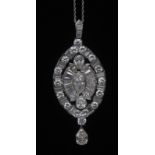 An impressive diamond pendant, central marquise diamond, surrounded by fifty round brilliant,