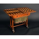 A 19th century walnut rounded rectangular combination work and games table,