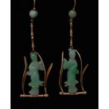 A pair of Chinese pale green jadeite and yellow metal earrings,