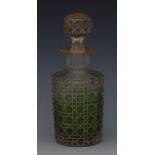 A Baccarat hobnail cut green flashed cylindrical scent bottle and stopper, picked out in gilt,