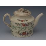 An 18th century English creamware cylindrical teapot and cover,