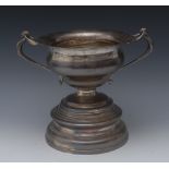 A George V silver two-handled compressed campana table vase, quite plain, divided scroll handles,