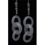 A pair of diamond and white jade drop earrings,