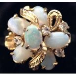 An opal and white stone flower head cluster ring,