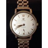 A gentleman's Cymaflex wrist watch, cream dial, Arabic numerals, subsidiary seconds,
