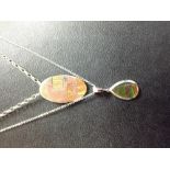 A Canadian Aurora silver and ammolite teardrop pendant necklace, boxed;  another,