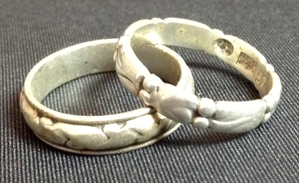 A Georg Jensen silver ring, over lapping stylised leaves, stamped 28B, 925S Denmark,