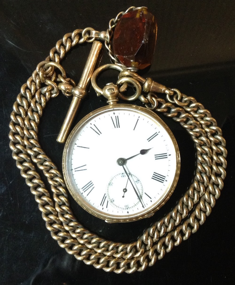 A continental 14ct gold open faced pocket watch, white dial, Roman numerals, minute track,