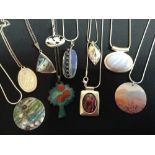 Jewellery - a sterling silver Falkland Isles pendant;  a Mick Oxley Rockpool pendant;  another,