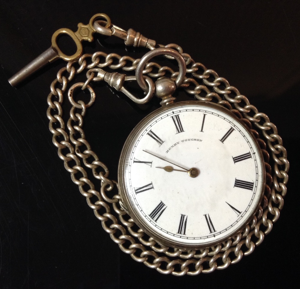 A Henry Touchon continental silver open face pocket watch, white enamel dial, Roman numerals,