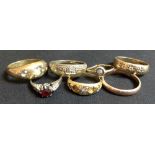 Jewellery - an 18ct gold flower head stone set ring, 4g gross; a 15ct paste set three stone ring, 2.