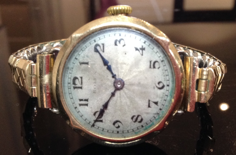 A lady's Rolex wrist watch, textured silvered dial, Arabic numerals, minute track, manual movement,