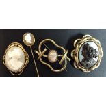 Jewellery - a Victorian oval lava Cameo brooch, possibly flora, pinchbeck multi-link mount,