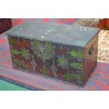 An Eastern teak metal bound chest, hinged top enclosing candle box,