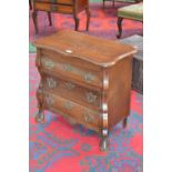 A reproduction oak bombe commode, of small proportions, slightly oversailing top, moulded edge,