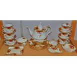 A Royal Albert Old Country Rose tea service for six comprising teapot, cups, saucers, sugar bowl,