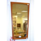 A Clark Eaton shaped teak mirror, c.